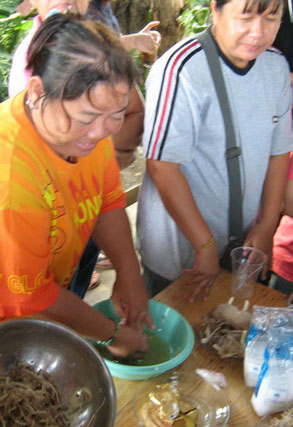 6. Mushroom cooking and processing demonstrated by Mong Kratae team leader.