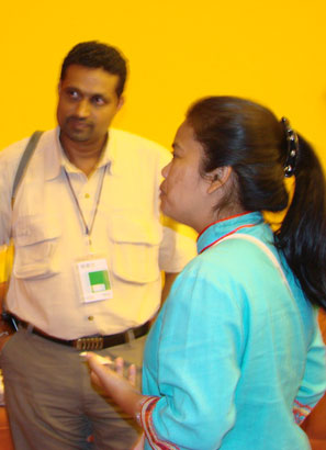 8.Jittin engaged in conversation with HEC workshop participants during the AsESG meeting in Beijing.