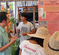 Mon describes ECN's conservation efforts to visitors at the festival.